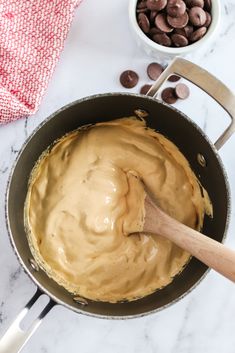 a pan filled with peanut butter and chocolate chips