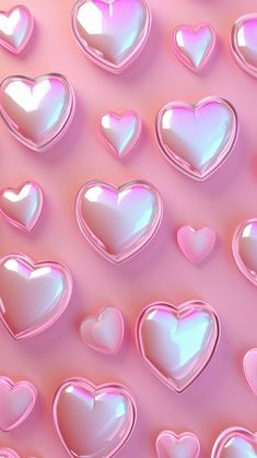 many shiny hearts are arranged in the shape of heart shapes on a pink and blue background