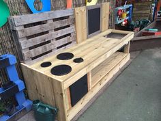 an outdoor kitchen made out of pallet wood