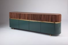 a green cabinet with wooden panels on top