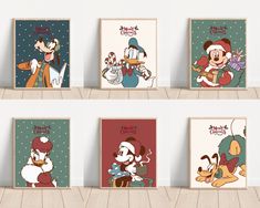 four cartoon characters are shown on the wall in this set of six prints, each featuring goofy and pluto