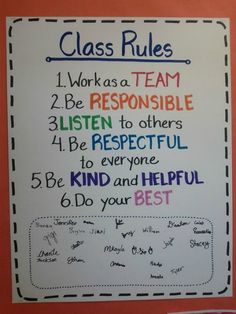 a classroom rules poster hanging on the wall in front of a bulletin board that says class rules