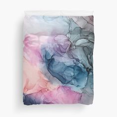 an abstract painting in pink, blue and white on a bed cover with pillow cases