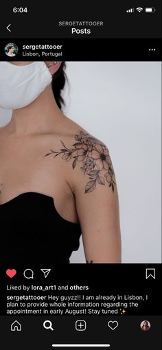 the back of a woman's shoulder with flowers tattooed on her left arm and chest