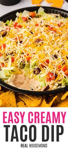 easy creamy taco dip with tortilla chips in the foreground and text overlay reading easy creamy taco dip