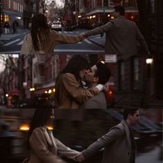 two people are kissing in the middle of a city street