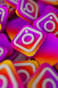 an image of colorful buttons with the instagram logo on them