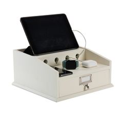 an electronic device in a white box on a white background