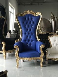 several different colored chairs in a room with white and gold trimmings on them