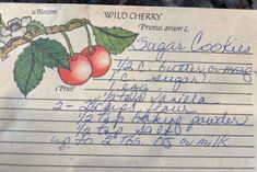 an old handwritten note with cherries on it