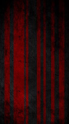 a red and black striped wallpaper with dark grungy lines in the middle