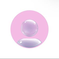 a pink circle with two bubbles floating in it