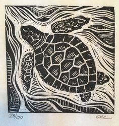 a black and white drawing of a turtle