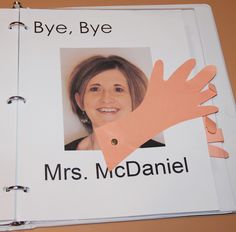 a close up of a book with an image of a person's hand on it