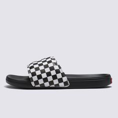 A Standout Slide Sandal Inspired by our HeritageInspired by Vans’ vulcanized roots, the La Costa Slide-On Checkerboard takes all of the iconic DNA from our Classics and wraps it up in a slide you’ll never want to take off. From the tonal checkerboard print on the straps to the iconic red heel scab, this sandal has an unmistakable Vans aesthetic. Add in a lightweight UltraCush Lite waffle outsole for comfort, and you’ve got a slide sandal that transcends summer. Slide sandal inspired by our vulca Casual Black Sandals For Surfing, Casual Black Sport Sandals For Swimming, Casual Sport Sandals For Surfing In Summer, Casual Summer Sport Sandals For Surfing, Vans Aesthetic, Vans Checkerboard, Vans Store, Vans Logo, Red Heels