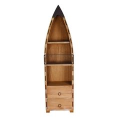 a wooden boat shaped shelf with drawers