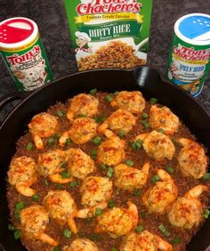 shrimp and rice in a skillet next to two cans of cheese gravy