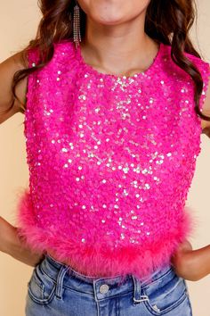 Introducing the "Feather or Not Sequins Crop Top" by Southern Grace, the ultimate statement piece for confident women who love to shine! This hot pink sequins top with its mesmerizing sparkle and playful feather trim is destined to turn heads and ignite your inner diva.Designed for unforgettable occasions like bachelorette parties, nights out on the town, or even attending a Taylor Swift concert, this crop top exudes elegance and radiates glamour. The vibrant hot pink sequins catch the light wit Hot Pink Sequin Top, Hot Pink Sparkly Top, Sequin Tops For Women, Pink Sequin Top Outfit, Pink Sparkle Outfit, Celebrities In Pink, Cute Neon Outfits, Pink Sparkle Top, College Tour Outfit