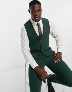 Suit jacket by ASOS DESIGN For office, or out of office V-neck Button placket Contrast back with an adjustable cinch Super-skinny fit Forest Green Vest Outfit Men, Green Vest Suit Men, Formal Fitted Green Vest, Green Fitted Formal Vest, Fitted Green Formal Vest, Elegant Fitted Green Vest, Tailored Dark Green Blazer For Work, Green Slim Fit Business Blazer, Green Fitted Classic Vest