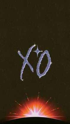 an xo logo is shown in the middle of space with fireworks coming out of it