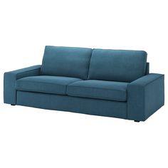 a blue couch sitting on top of a white floor