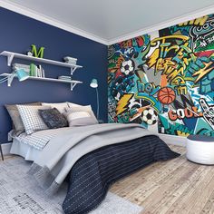 a bedroom decorated in blue and white with graffiti on the wall, bedding and rugs