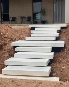 some white steps in front of a building