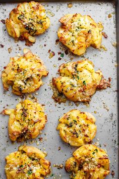 some food that is sitting on a baking sheet and ready to be cooked in the oven