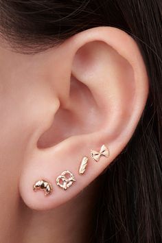 Freshly baked and ready to wear. Perfect for the bread lover in all of us, plus it's gluten-free ;) Gold Tragus Earrings, Flat Back Earrings Studs, Tiny Ear Piercings, 4th Lobe Piercing, Jewelry Trends 2024, Macaron Earrings, Ear Stacks, Baguette Studs, Simple Studs