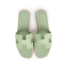 This pair of Oran Sandals are in Vert Jade epsom with the iconic H crossover strap and beige leather soles. Origin: ItalyCondition: New and never wornAccompanied by: Hermes box, dustbags, and carebookSize: 39.5 EU Green Hermes, Hermes Oran Sandals, Hermes Oran, Hermes Box, Natural Leather, Leather Heels, Crossover, Jade, Fendi