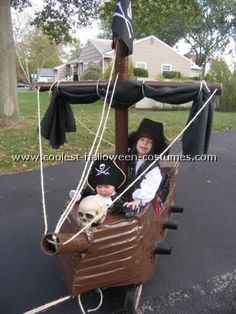 two children in a pirate ship costume