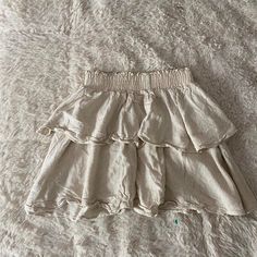 Brand New Princess Polly Skirt Size 6 So It Would Fit Size Small-Medium Never Worn Beige Ruffled Skirt Bottoms, Beige Skirt With Elastic Waistband For Day Out, Beige Mini Skirt For Summer, Beige Tiered Mini Skirt For Beach, Summer Tiered Skirt In Beige, Beige Tiered And Lined Mini Skirt, Summer Beige Tiered Skirt, High Waist Beige Skirt For Vacation, Beige Lined Mini Skirt For Vacation