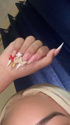 Blue Curved Nails, French Pointy Nails, Junk Stiletto Nails, Long Blinged Out Nails, Hello Kitty Stiletto Nails, Xl Birthday Nails, Baddie Duck Nails, Square Nails With Stiletto Pinky