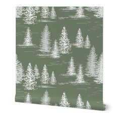 a green wallpaper with white trees on it