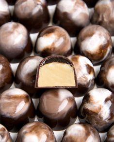 chocolate covered candies with peanut butter in the middle