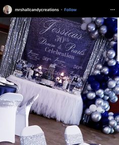 an image of a table set up for a wedding reception with silver and white decorations