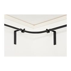 an image of a bed rail with two black rails attached to the side of it