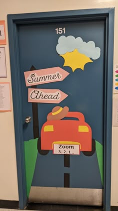 a door decorated with the words summer ahead