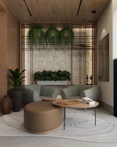 a living room filled with lots of furniture next to a wall mounted planter and potted plants