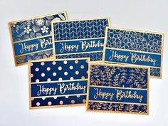 five happy birthday cards in blue and gold