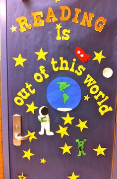 a door decorated with the words reading is out of this world