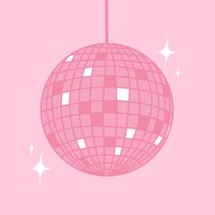 a pink disco ball hanging from a string