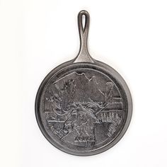 an old cast iron frying pan on a white background