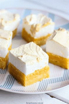 four pieces of cake sitting on top of a plate