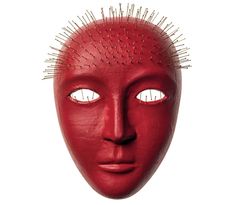 a red mask with spikes on it's face