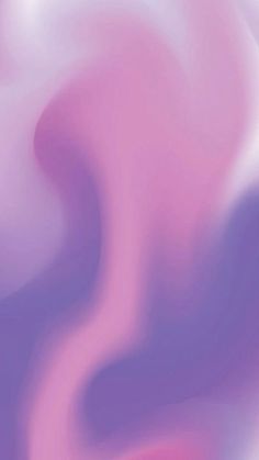 an abstract blurry background with pink and purple colors