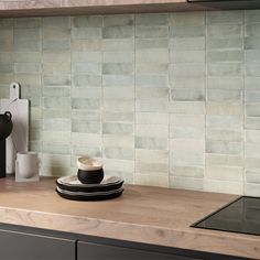 a kitchen counter with a coffee cup on it