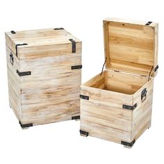 two wooden boxes sitting next to each other