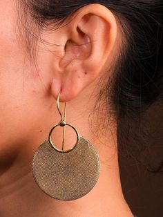 "These Chandini Earrings are the perfect blend of class and quirk, with their round shape and 2 inch size. Made of brass, they add a touch of sophistication to any outfit. How's that for a hock of style? (See what we did there?) Trust us, these earrings will make you feel like a million bucks! (Oops, that's three exclamation points...but trust us, it's worth it!)" Angel Wing Ear Cuff, Tarnish Remover, Quirky Fashion, Classy Jewelry, Chakra Bracelet, Brass Earrings, Leather Chain, Worth It, Round Shape