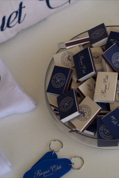 a plate full of blue and white luggage tags